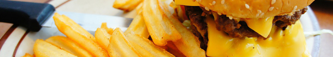 Eating American (Traditional) Burger Sandwich at Steak-Out restaurant in Huntsville, AL.